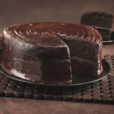A round chocolate sponge filled, coated with rich mouth-watering chocolate fudge. It is a gluten free chocolate cake, the perfect desert to fill your mouth with pure velvet sweetness.